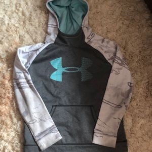 Grey, white, and turquoise under armor girls hoodie.